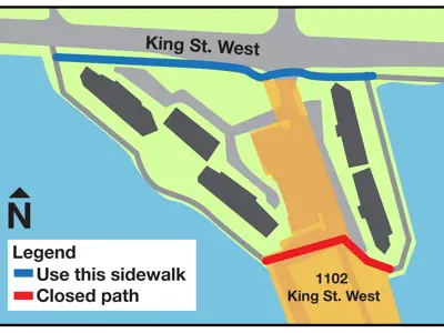 Map showing the waterfront trail closure near 1102 King St, marked in red. An alternate route along the King Street West sidewalk is marked in blue.